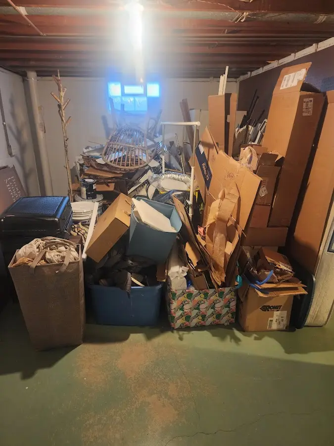 Roll-off dumpster container at job site for 2 Yard Dumpster Rental in East China